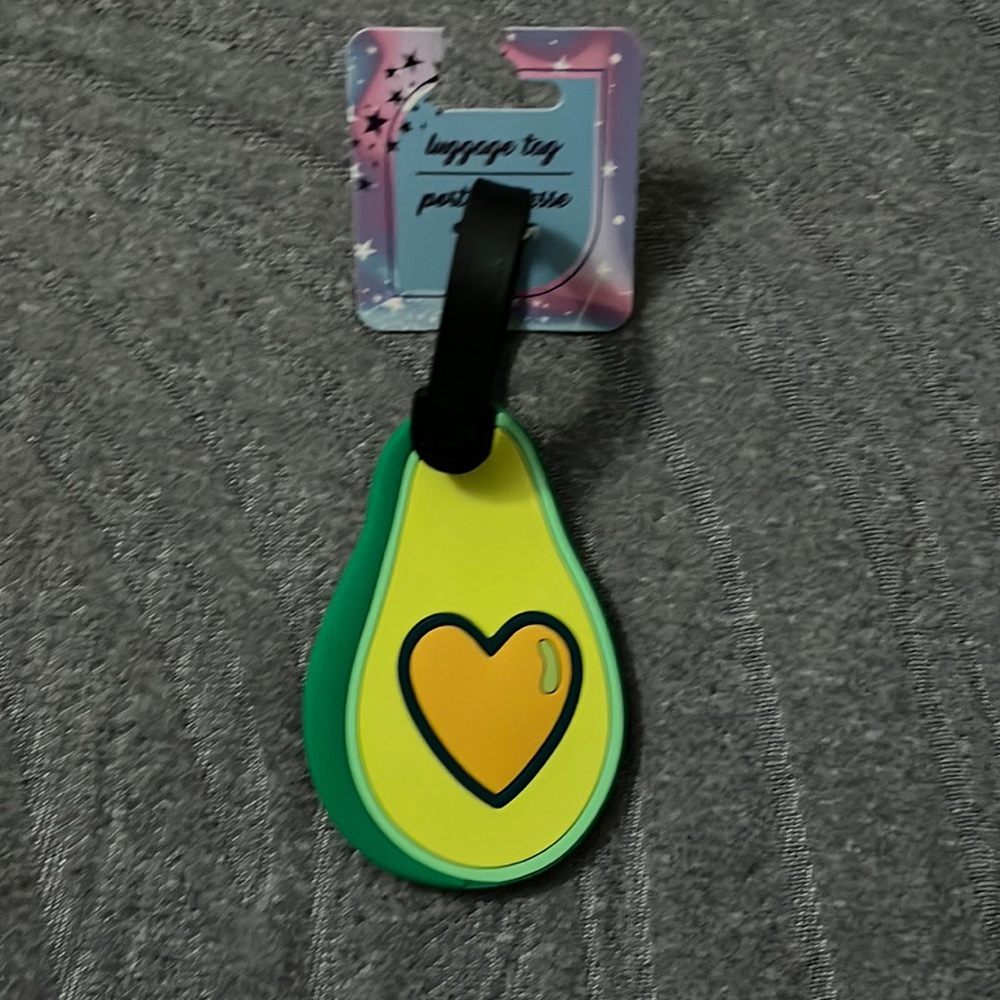 Finding your luggage will be easier with this guy- Luggage Tag- Avocado